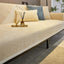 Beige ribbed jacquard chenille modular couch cover shown on a sofa