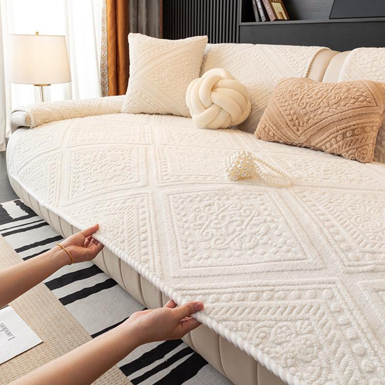 Beige plush sofa cover with an embossed geometric pattern Imagen principal del producto