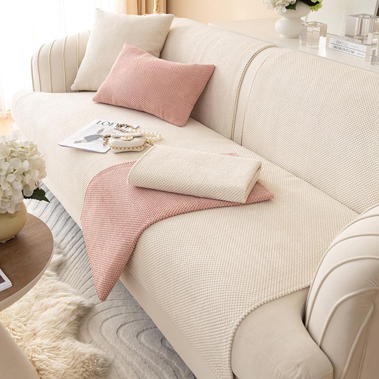 Textured Bobble Sofa Cover with Scalloped Edges shown on a sofa