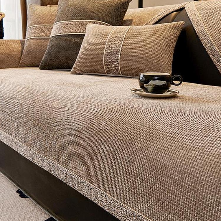 Textured Chenille Sofa Cover with Contrast Trim shown on a sofa