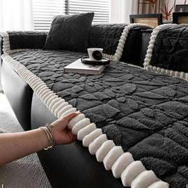 Clover-Pattern Plush Sofa Cover with Scalloped Trim shown on a sofa