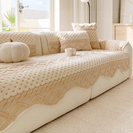 Scalloped Plush Sofa Cover with Geometric Border shown on a sofa