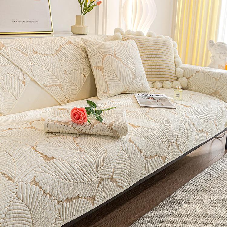 Embossed Tropical Leaf Cotton Non-Slip Couch Cover styled on a sofa