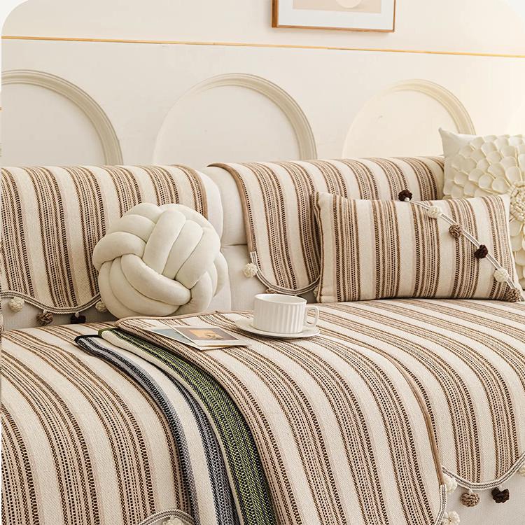 Brown stripe seat cover on a light sofa — gsft-9056