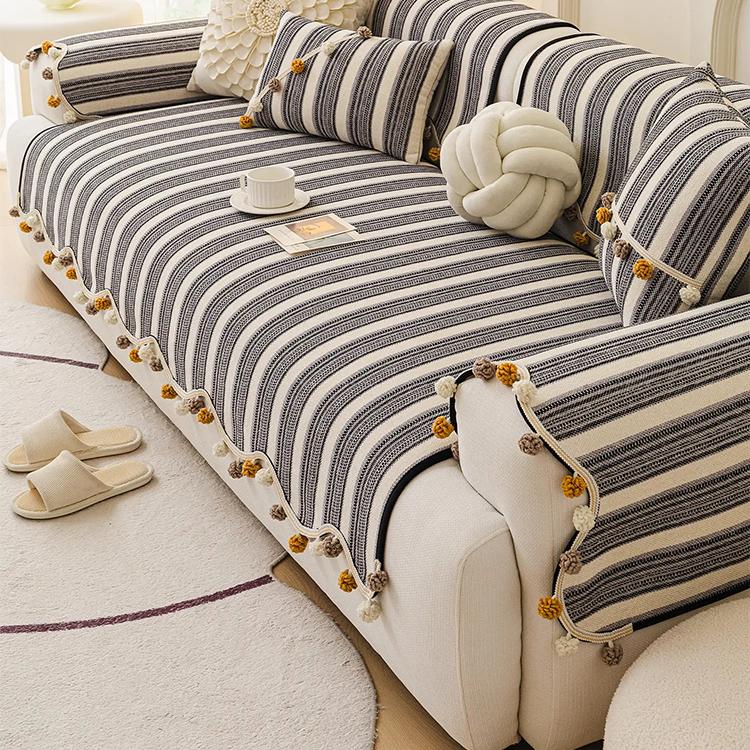 Gray striped cover with pom-pom edging — gsft-9056
