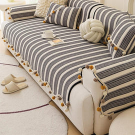 Gray striped cover with pom-pom edging — gsft-9056