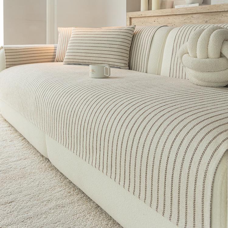 Soft Pinstripe Chenille Non-Slip Couch Cover styled on a sofa