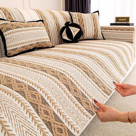 Lifting the herringbone stripe cover from the sofa — gsft-9059
