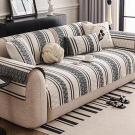 Geometric stripe cover draped across a sofa — gsft-9061