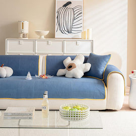 Front view of the blue quilted sofa cover — gsft-9065