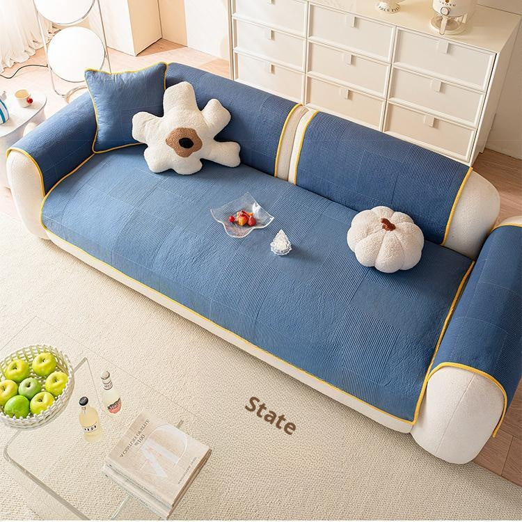 Angled view of the heart quilted sofa cover — gsft-9065