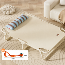 Beige elevated dog bed for pets up to 25 lb, with orange rope toy