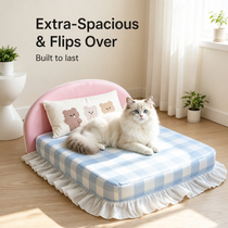 Ruffled trim and rounded mattress edges add a soft furniture-inspired finish