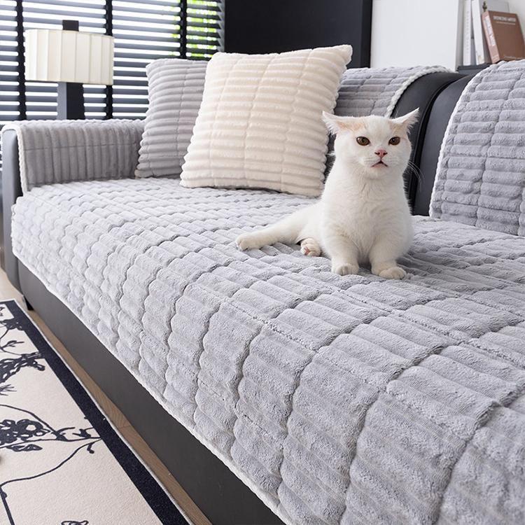 Light gray ribbed plush fleece modular couch cover shown on a sofa