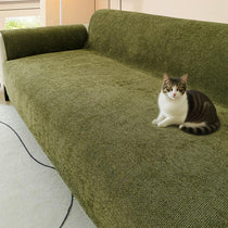 Nano-Shield Waterproof Chenille Sofa Cover shown across a sofa with a pet