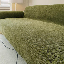 Nano-Shield Waterproof Chenille Sofa Cover shown across a sofa with a pet