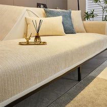 Beige ribbed jacquard chenille modular couch cover shown on a sofa