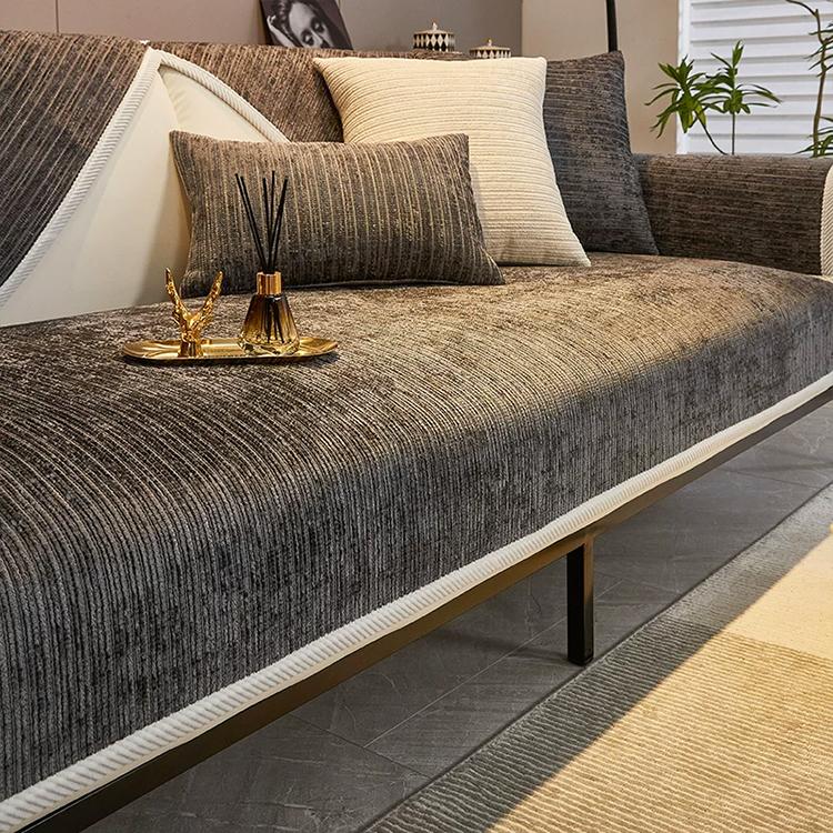 Dark gray ribbed jacquard chenille modular couch cover shown on a sofa