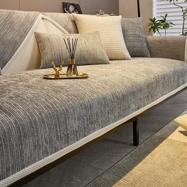 Light gray ribbed jacquard chenille modular couch cover shown on a sofa