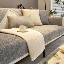 Ribbed Jacquard Chenille Modular Couch Cover styled on a contemporary sofa