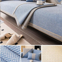 Blue contrast-trim woven faux linen couch cover shown on a sofa