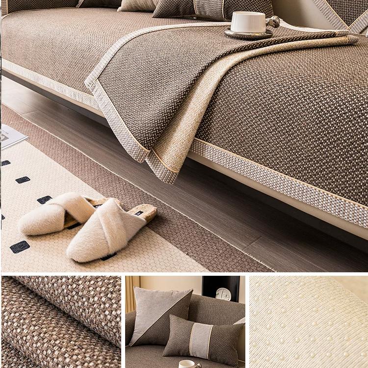 Coffee contrast-trim woven faux linen couch cover shown on a sofa