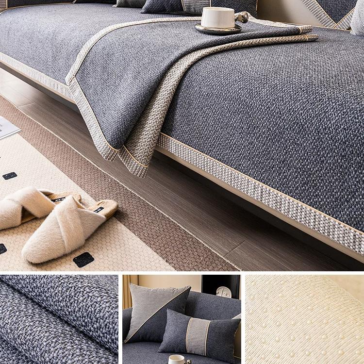 Dark gray contrast-trim woven faux linen couch cover shown on a sofa