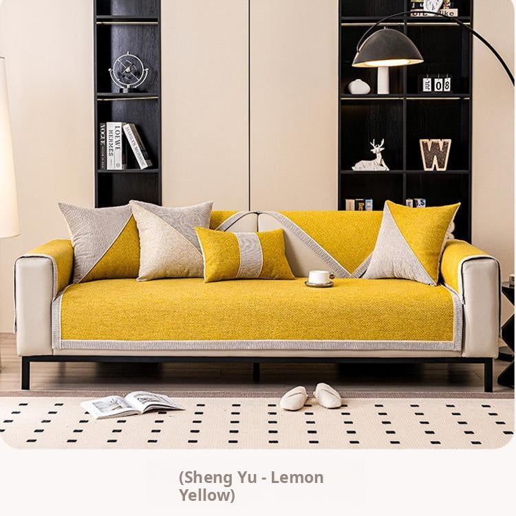 Contrast-Trim Woven Faux Linen Couch Cover styled on a clean-lined modern sofa