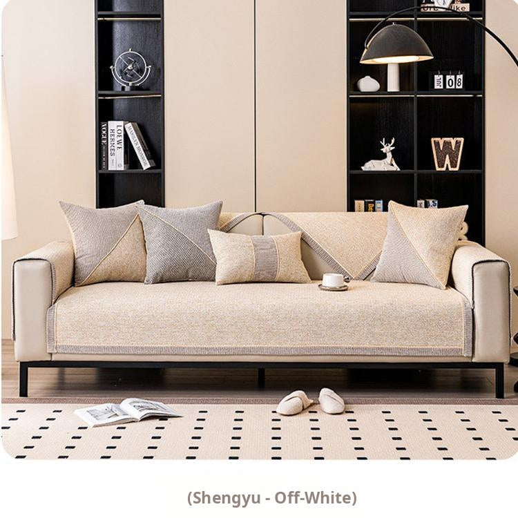 Contrast-Trim Woven Faux Linen Couch Cover styled on a clean-lined modern sofa