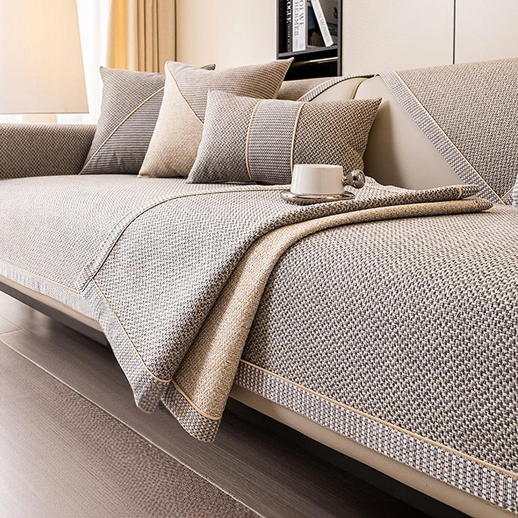 Contrast-Trim Woven Faux Linen Couch Cover styled on a modern sofa