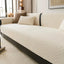 Beige boucle-style chenille modular couch cover shown on a sofa
