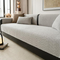 Light gray boucle-style chenille modular couch cover shown on a sofa