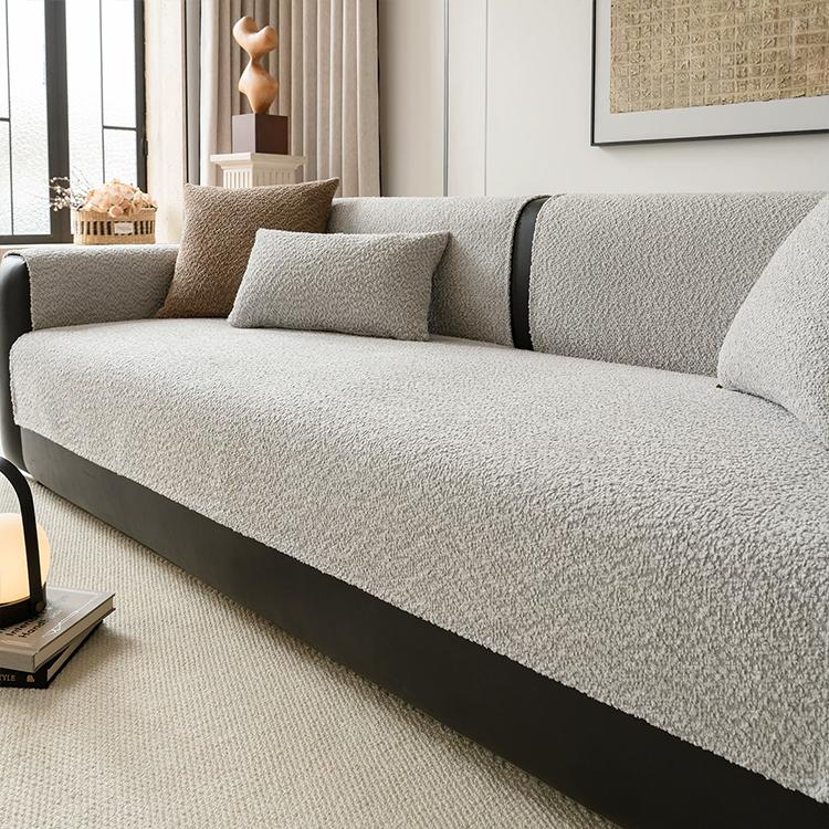 Light gray boucle-style chenille modular couch cover shown on a sofa