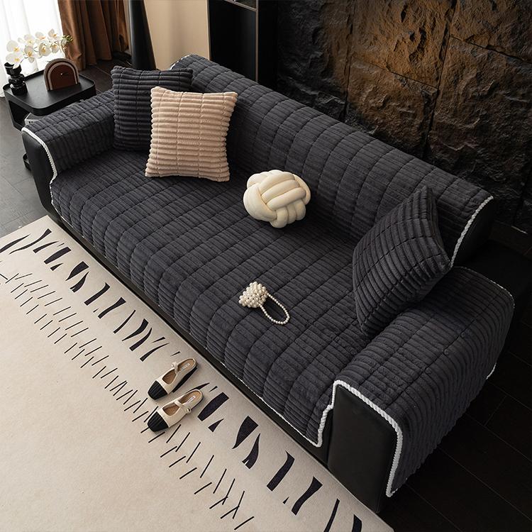 Plush Ribbed Fleece Couch Cover detail showing the cover draped across a sofa