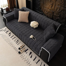 Plush Ribbed Fleece Couch Cover detail showing the cover draped across a sofa