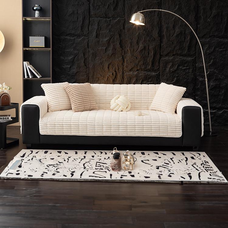Plush Ribbed Fleece Couch Cover detail showing the cover draped across a sofa