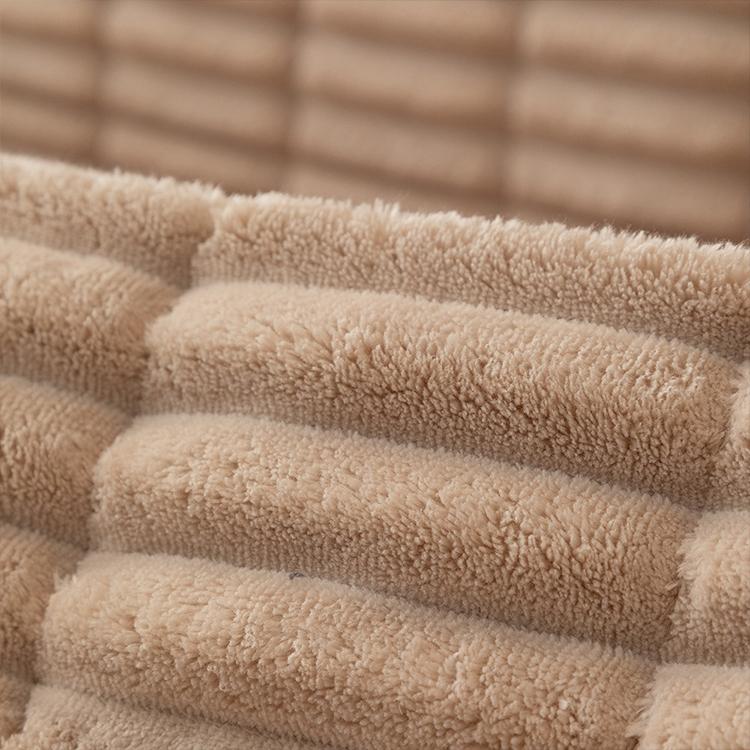 Plush Ribbed Fleece Couch Cover detail showing the cover draped across a sofa