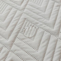 Water-Resistant Geometric Quilted Couch Cover detail showing the dimensional quilt stitching