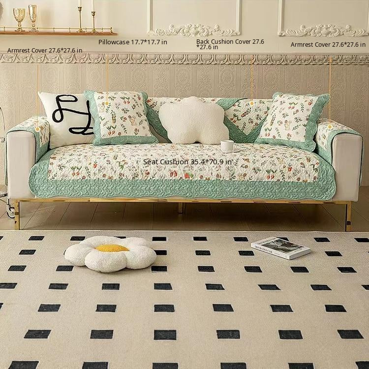 Reversible Patterned Cotton Couch Cover detail showing a coordinated sofa-and-cushion arrangement