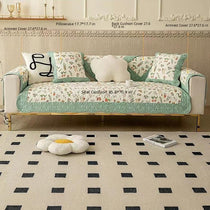 Reversible Patterned Cotton Couch Cover detail showing a coordinated sofa-and-cushion arrangement