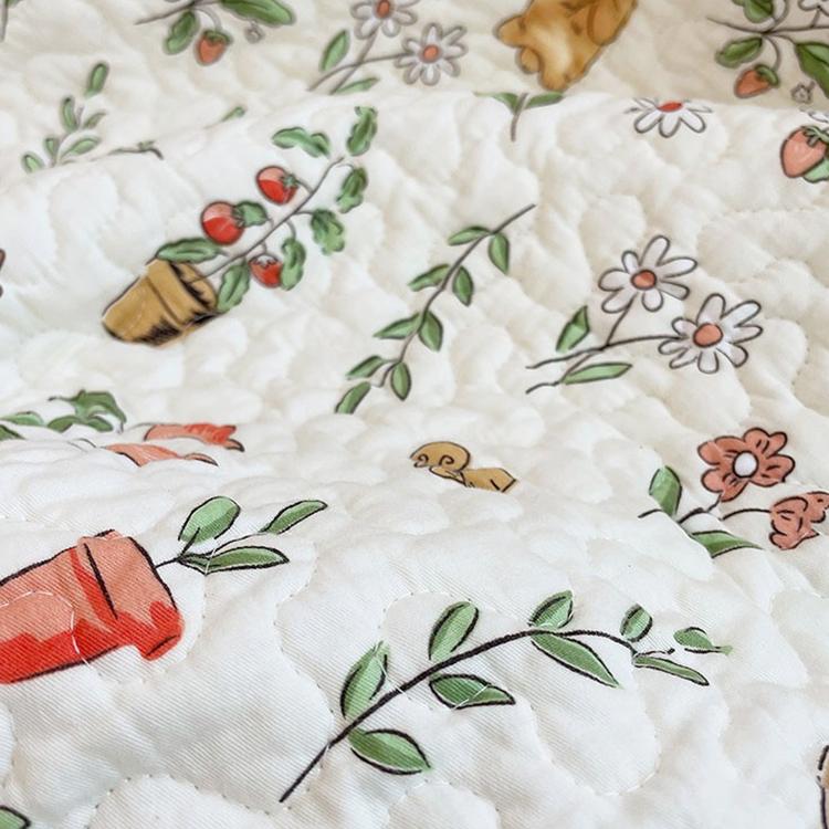 Reversible Patterned Cotton Couch Cover detail showing the quilted cotton surface