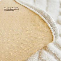 Sculpted Wave Plush Couch Cover detail showing the softly finished edge