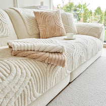 Sculpted Wave Plush Couch Cover detail showing the coordinated neutral palette