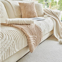 Sculpted Wave Plush Couch Cover styled across a sofa
