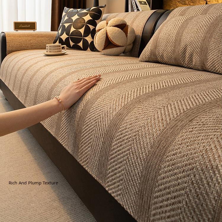 Hand smoothing the textured sofa cover