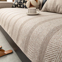 Light coffee brown couch cover on a sofa