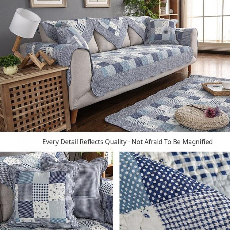 Red-gray patchwork cover styled across a sofa