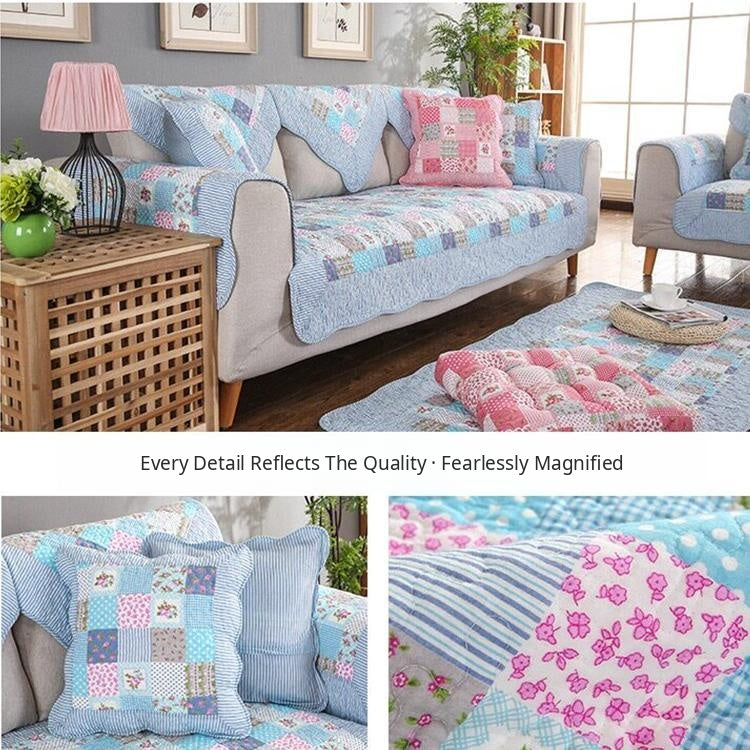 Blue floral quilted couch cover
