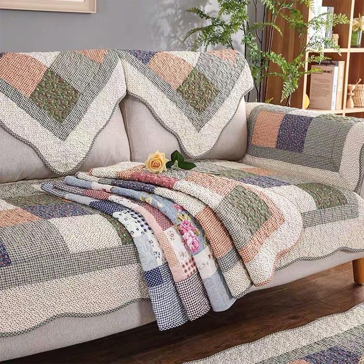Quilted Patchwork Cotton Modular Couch Cover styled on a sofa Main image