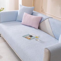 Light blue honeycomb couch cover